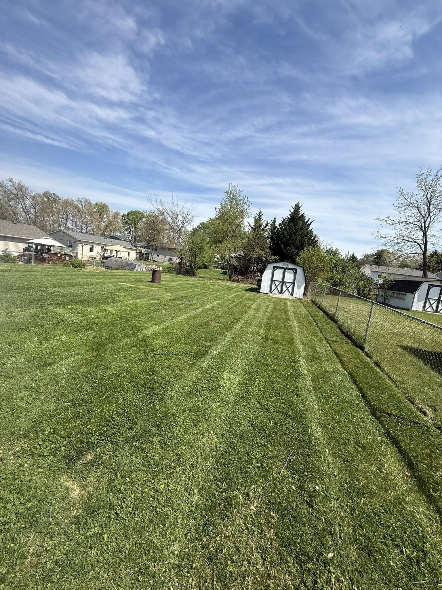 Mowed hillside backyard in Harrisonburg VA