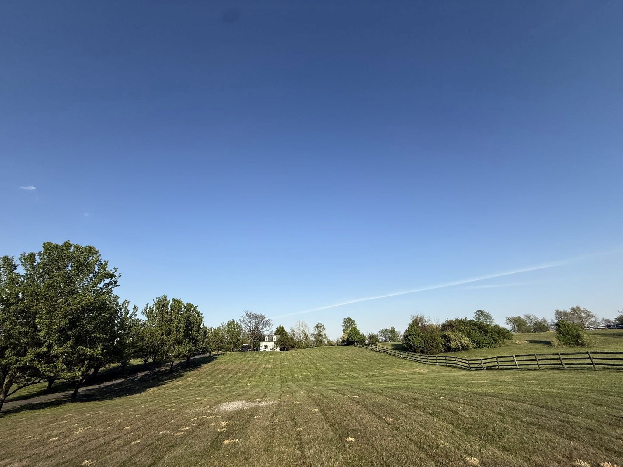 Large estate mowing along fence line in Harrisonburg VA