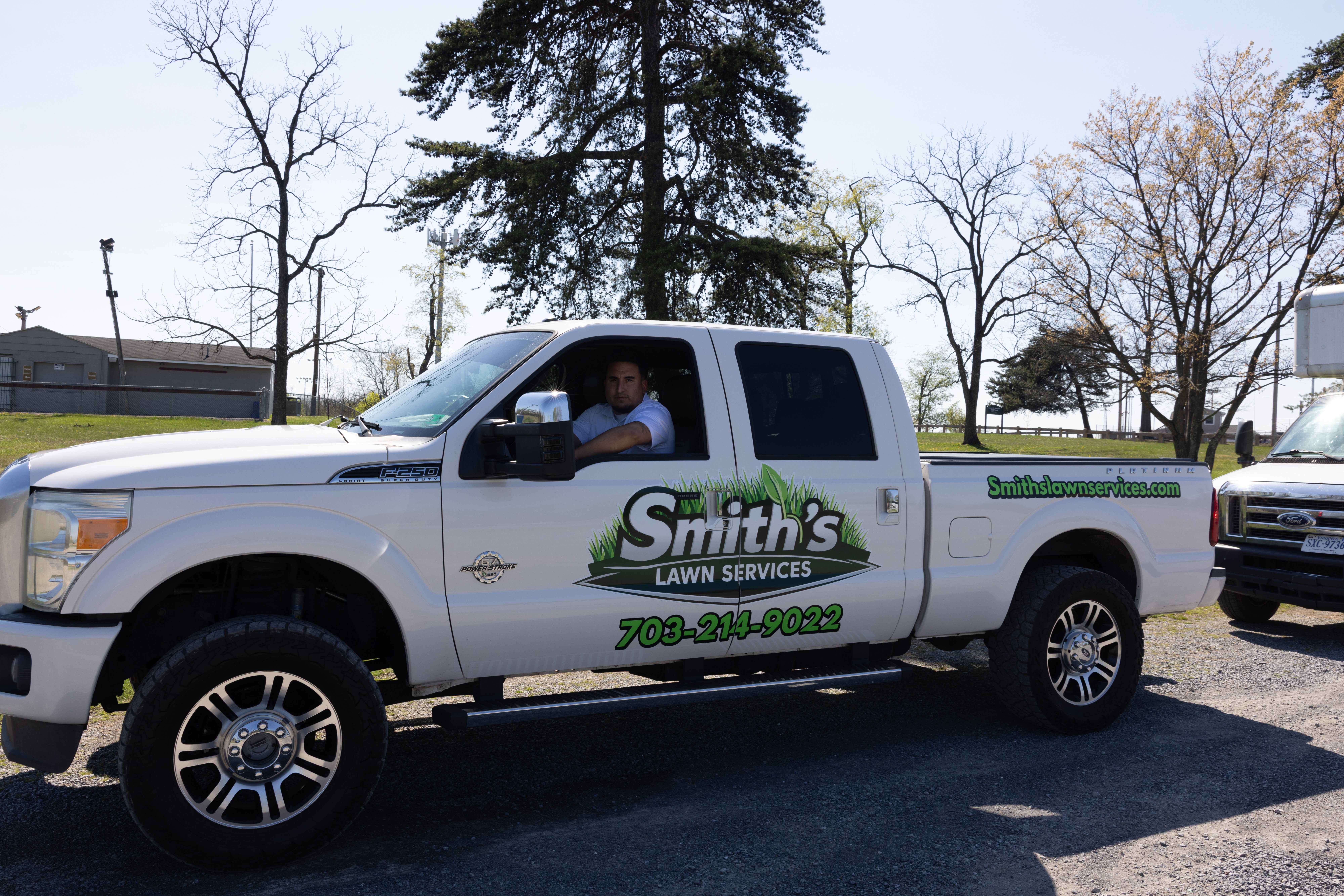Smith's Lawn Services crew pickup truck