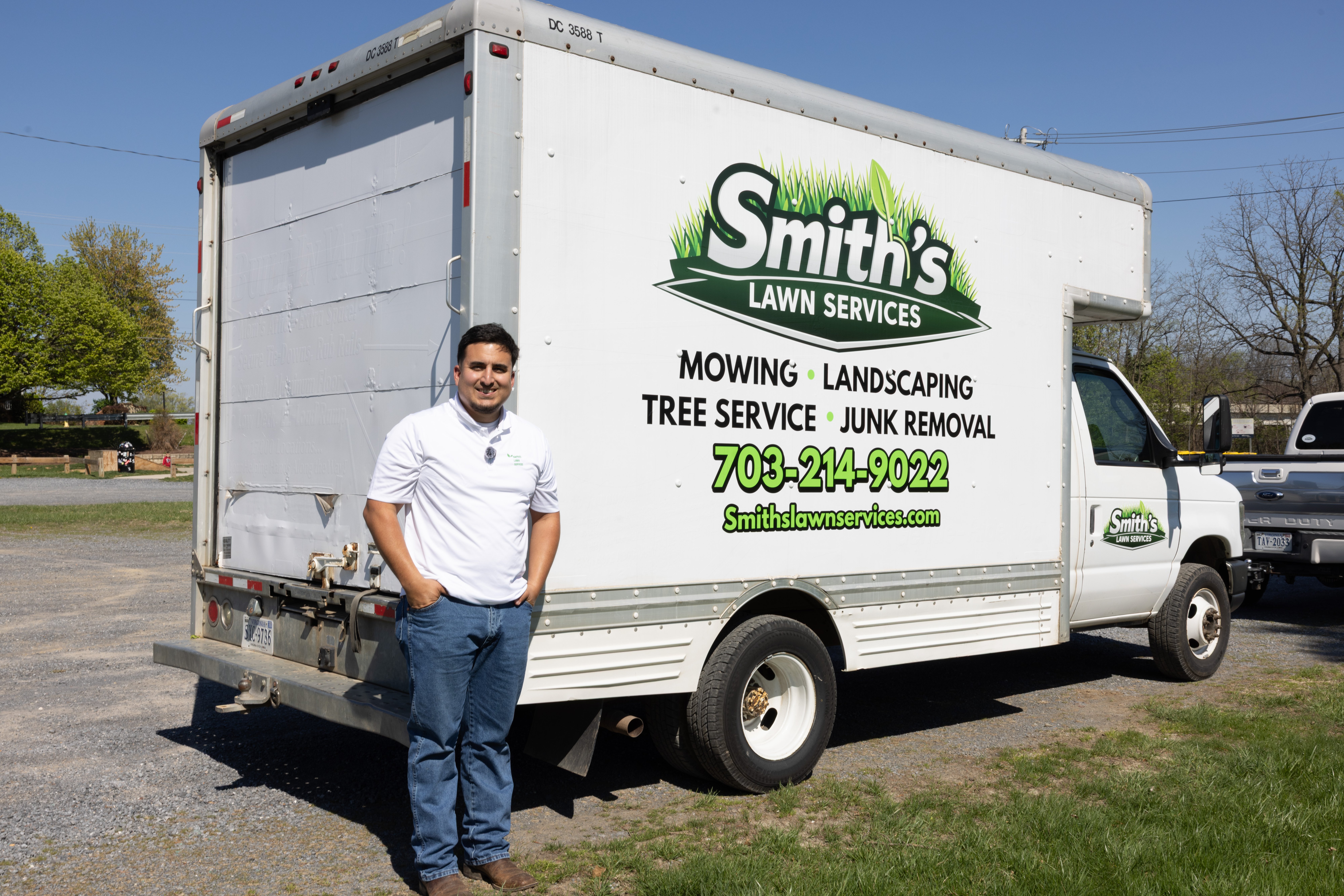 Smith's Lawn Services owner with the company box truck