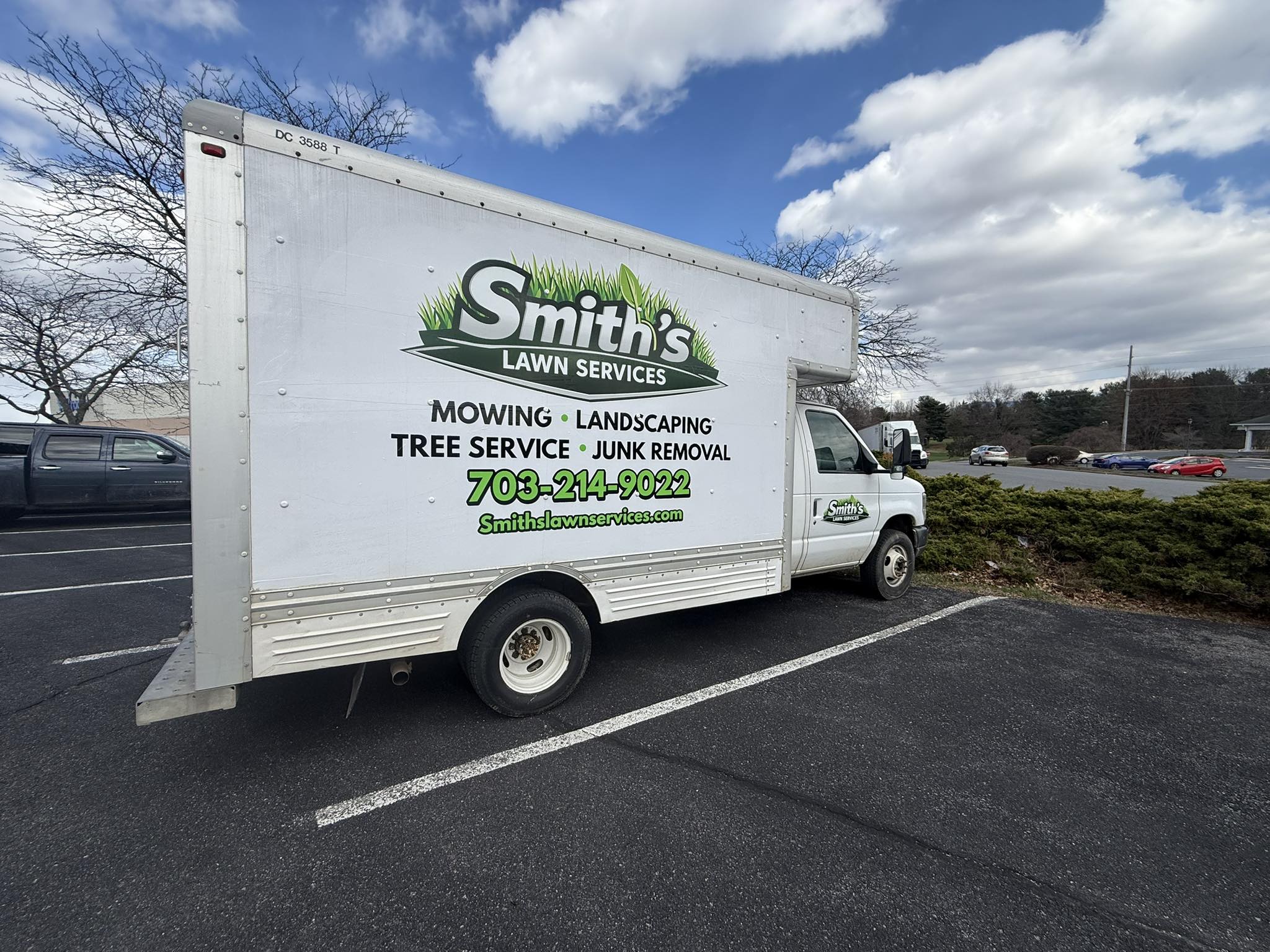 Smith's Lawn Services branded truck